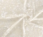 White embroidered tulle flower