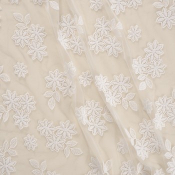 White floral embroidery on tul