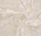 White floral embroidery on tul