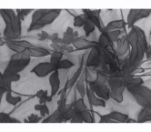 Black organza flower on tulle