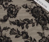 Black floral embroidery on tul