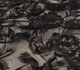 Black floral embroidery on tul
