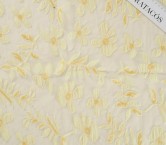 Flores de organza sobre tul amarillo