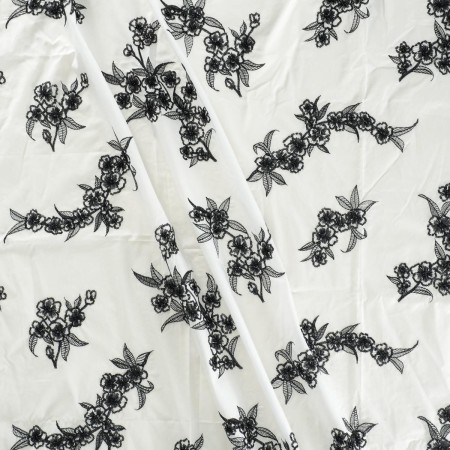 White embroidered cotton flower