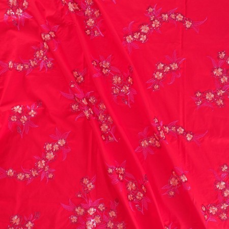 Red embroidered cotton flower