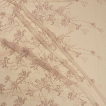 Bordado floral abstracto piel