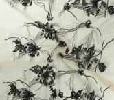 Black fluid metallic flower embroidery