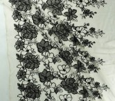 Black floral embroidery with bubble organza