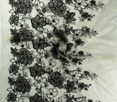 Black floral embroidery with bubble organza