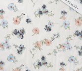 Embroidered garden on tulle azul claro