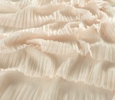 Peach ruffles in tulle with dots
