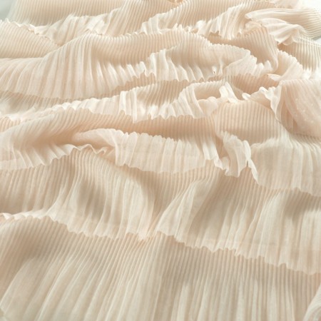 Peach ruffles in tulle with dots