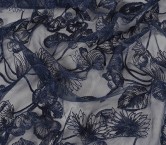 Navy outlined floral embroidery